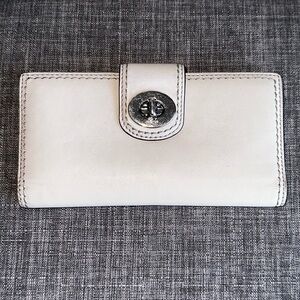 Coach Ivory Leather Turn Lock Long Wallet in good used condition $15